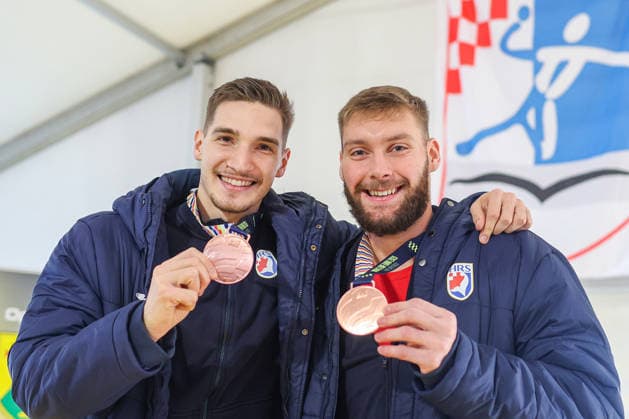 Welcome ceremony for Croatian handball players Dominik Kuzmanovic and Zlatko Rauzan Croatian handball players Dominik Kuzmanovic and Zlatko Rauzan pose with bronze medals during welcome ceremony in Brckovljani near Zagreb, Croatia on February, 2026. after winning bronze medal at Men s EHF EURO 2026.  GoranxStanzl PIXSELL