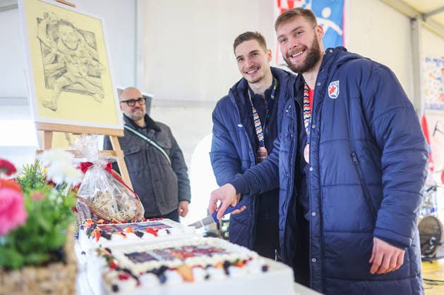 Welcome ceremony for Croatian handball players Dominik Kuzmanovic and Zlatko Rauzan Croatian handball players Dominik Kuzmanovic and Zlatko Rauzan slice a cake during welcome ceremony in Brckovljani near Zagreb, Croatia on February, 2026. after winning bronze medal at Men s EHF EURO 2026.  GoranxStanzl PIXSELL