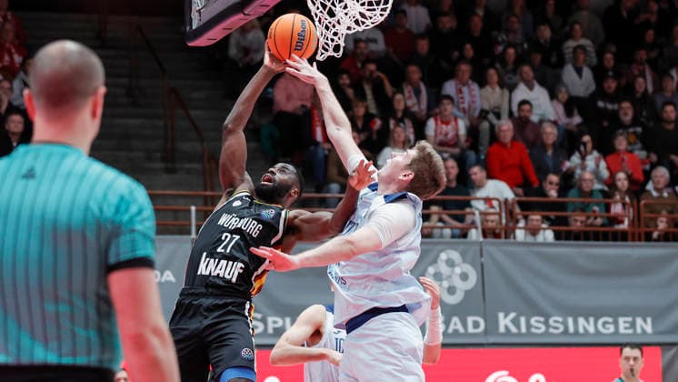In the picture from left Eddy Edigin Wuerzburg Baskets, 27 against Simon Birgander Joventut Badalona, 35 03 02 2026, Fitness First Wuerzburg Baskets vs Joventut Badalona, Basketball Champions League, Round of 16, Group K, Matchday 3, Germany, 97072, tectake Arena Wuerzburg, Copyright: HMBxMedia xJulienxBecker