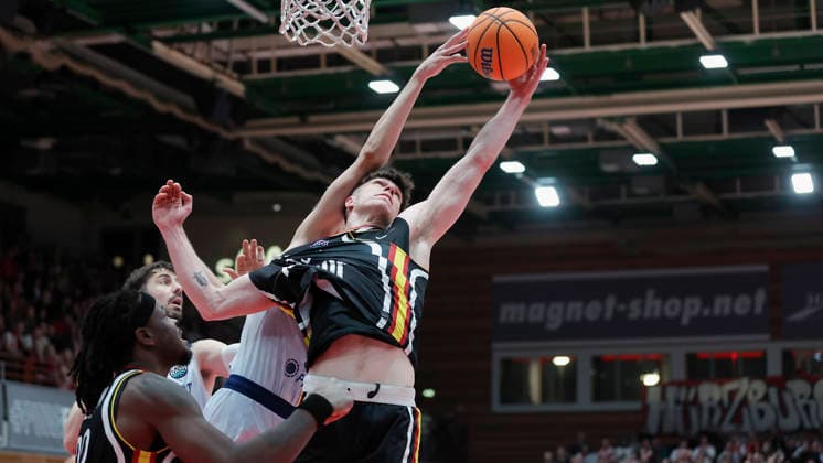 In the picture Christian Skladanowski Wuerzburg Baskets, 19 with the rebound 03 02 2026, Fitness First Wuerzburg Baskets vs Joventut Badalona, Basketball Champions League, Round of 16, Group K, Matchday 3, Germany, 97072, tectake Arena Wuerzburg, Copyright: HMBxMedia xJulienxBecker