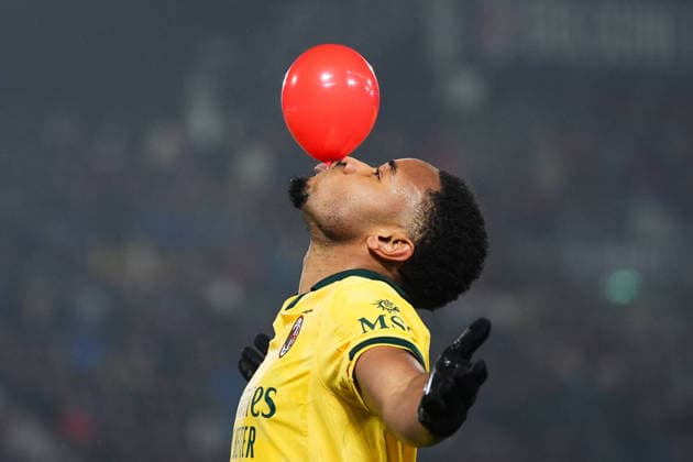AC Milan s Christopher Nkunku celebrates after scoring the 0-2 goal for his team during the Serie A soccer match between Bologna and Milan at the Renato DallÕAra Stadium in Bologna, north Italy - Tuesday, February 3, 2026 -  Copyright: xMassimoxPaolone LaPressex