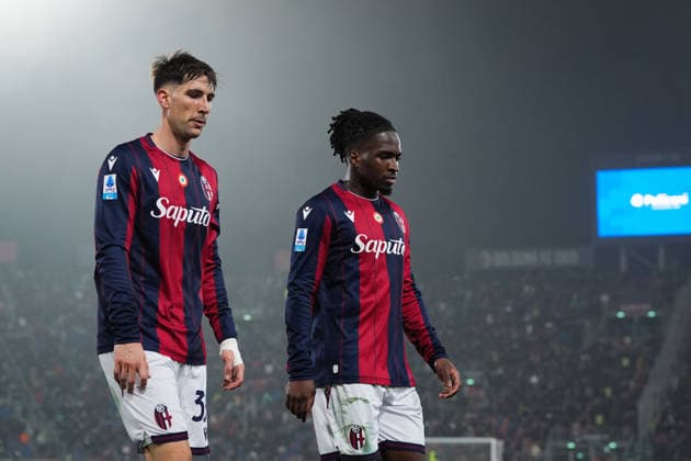 Bologna s Juan Miranda and Bologna s Jonathan Rowe leave the field with head down during the Serie A soccer match between Bologna and Milan at the Renato DallÕAra Stadium in Bologna, north Italy - Tuesday, February 3, 2026 -  Copyright: xMassimoxPaolone LaPressex