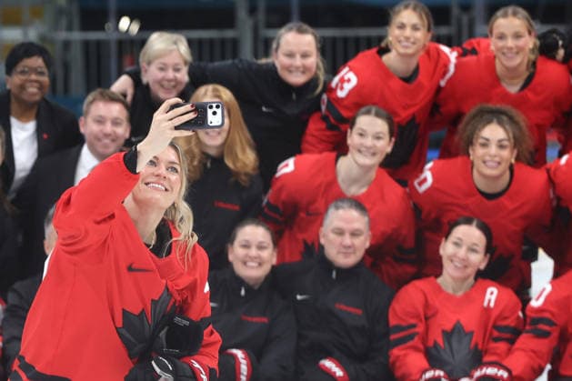 The Canadian womens hockey player Natalie Spooner (24) takes a team selfie photo prior to their practice on Wednesday, February 4, 2026, before the start of the Milan 2026 Winter Olympics.  OLY20260204333 AARONxJOSEFCZYK