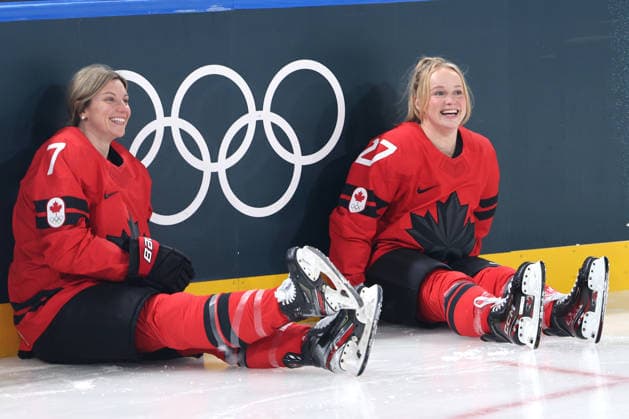 Canadian womens hockey pose for a photo in front of the Olympic rings prior to their practice on Wednesday, February 4, 2026, before the start of the Milan 2026 Winter Olympics.  OLY20260204334 AARONxJOSEFCZYK