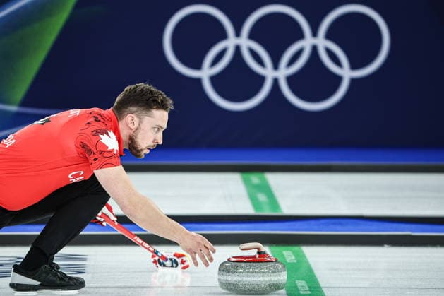 ITALY, CORTINA D AMPEZZO - FEBRUARY 4, 2026: Curler Brett Gallant of Canada is in action in the Mixed Doubles Round Robin Session 1 curling event during the 2026 Winter Olympic Games, Olympische Spiele, Olympia, OS at the Cortina Curling Olympic Stadium. Mikhail Tereshchenko TASS  88208688