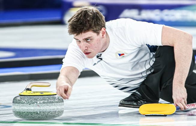 ITALY, CORTINA D AMPEZZO - FEBRUARY 4, 2026: Curler Vit Chabicovsky of Czechia is in action in the Mixed Doubles Round Robin Session 1 curling event during the 2026 Winter Olympic Games, Olympische Spiele, Olympia, OS at the Cortina Curling Olympic Stadium. Mikhail Tereshchenko TASS  88209325