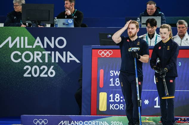 ITALY, CORTINA D AMPEZZO - FEBRUARY 4, 2026: Curlers Rasmus Wrana (L) and Isabella Wrana of Sweden are seen in the Mixed Doubles Round Robin Session 1 curling event during the 2026 Winter Olympic Games, Olympische Spiele, Olympia, OS at the Cortina Curling Olympic Stadium. Mikhail Tereshchenko TASS  88209514