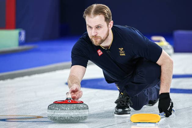 ITALY, CORTINA D AMPEZZO - FEBRUARY 4, 2026: Curler Rasmus Wrana of Sweden is in action in the Mixed Doubles Round Robin Session 1 curling event during the 2026 Winter Olympic Games, Olympische Spiele, Olympia, OS at the Cortina Curling Olympic Stadium. Mikhail Tereshchenko TASS  88209983