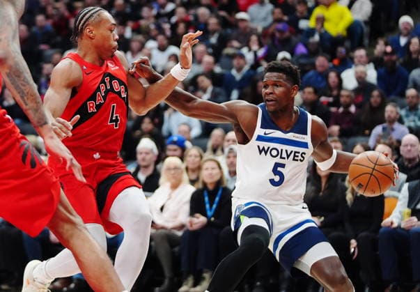 February 4, 2026, Toronto, On, CANADA: Minnesota Timberwolves Anthony Edwards (5) protects the ball from Toronto Raptors Scottie Barnes (4) during first half NBA, Basketball Herren, USA basketball action in Toronto on Wednesday, Feb. 4, 2026. Canada News - February 4, 2026  - ZUMAc35_ 20260204_zaf_c35_105 Copyright: xFrankxGunnx
