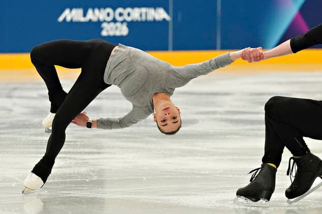 Karina Akopova is spun by her partner Nikita Rakhmanin of Armenia, during Pairs Figure skating, Eiskunstlauf practice before the start of the Milan 2026 Winter Olympic Games, Olympische Spiele, Olympia, OS at the Milano Ice Skating Arena in Milan, Italy on Wednesday, February 5, 2026.  OLY20260205113 RichardxEllis