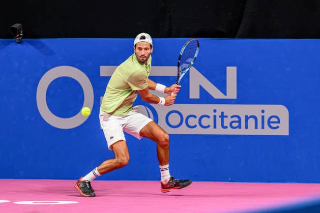 February 5, 2026, Perols, Montpellier, Occitanie, France: Titouan Droguet of France delivers a back hand shot during his match against Aleksandar Kovacevic of the United States at Open Occitanie on February 5, 2026, at Sud de France Arena in Montpellier, France. Perols, Montpellier France - ZUMAc313 20260205_zsp_c313_001 Copyright: xFaresxChafaix