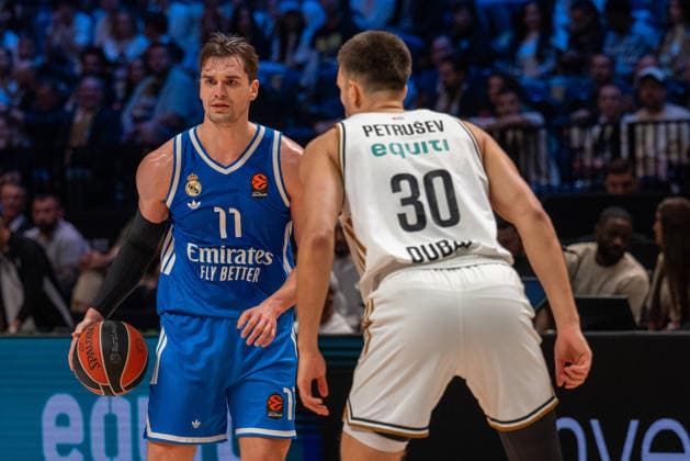 Dubai Basketball v Real Madrid - EuroLeague DUBAI, UNITED ARAB EMIRATES - FEBRUARY 5: Mario Hezonja of Real Madrid in action against Filip Petrusev of Dubai Basketball during the EuroLeague 2025–26 regular season game at Coca-Cola Arena in Dubai, United Arab Emirates on February 5, 2026. Waleed Zein Anadolu Dubai United Arab Emirates. Editorial use only. Please get in touch for any other usage.  Copyright: x2026xAnadoluxWaleedxZeinx