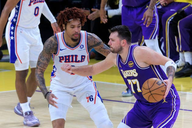 February 5, 2026, Los Angeles, California, USA: Luka Doncic 77 of the Los Angeles Lakers pushes off Kelly Oubre Jr. 9 of the Philadelphia 76ers during their regular season NBA, Basketball Herren, USA game on Thursday February 5, 2026 at Crypto.com Arena in Los Angeles, California. ARIANA RUIZ PI Los Angeles USA - ZUMAp124 20260205_zaa_p124_011 Copyright: xArianaxRuizx