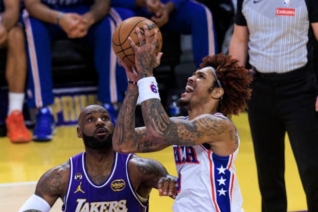 February 5, 2026, Los Angeles, California, USA: Kelly Oubre Jr. 9 of the Philadelphia 76ers performs a layup as LeBron James 23 of the Los Angeles Lakers defends during their regular season NBA, Basketball Herren, USA game on Thursday February 5, 2026 at Crypto.com Arena in Los Angeles, California. ARIANA RUIZ PI Los Angeles USA - ZUMAp124 20260205_zaa_p124_018 Copyright: xArianaxRuizx