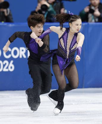 Milan Cortina Olympics: Figure skating, Eiskunstlauf Japanese ice dancers Utana Yoshida (R) and Masaya Morita perform their rhythm dance during the figure skating team event at the Milan Cortina Olympics at Milano Ice Skating Arena in Milan on Feb. 6, 2026.  A14AA0005248587P