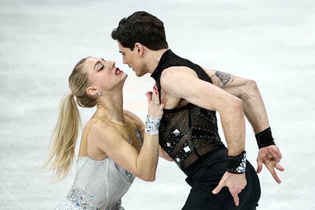 ITALY, MILAN - FEBRUARY 6, 2026: Ice dancers Piper Gilles (L) and Paul Poirier of Canada perform their rhythm dance during the team Figure skating, Eiskunstlauf event at Milano Ice Skating Arena as part of the 2026 Winter Olympic Games, Olympische Spiele, Olympia, OS 2026 Winter Olympics: Team Figure Skating, Rhythm Dance  - ZUMAt113 20260206_zaa_t113_056 Copyright: xMikhailxTereshchenkox