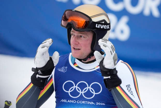 Simon Jocher of Germany looks at his time after a practice run on the Stelvio course during the 3rd official training session for the Men s downhill skiing competition at the Milano Cortina 2026 Winter Olympic Games, Olympische Spiele, Olympia, OS in Bormio, Italy, on Friday, February 6, 2026. The downhill medal competition will take place on Saturday, February 7, 2026.  BOR20260206916 BOBxSTRONG