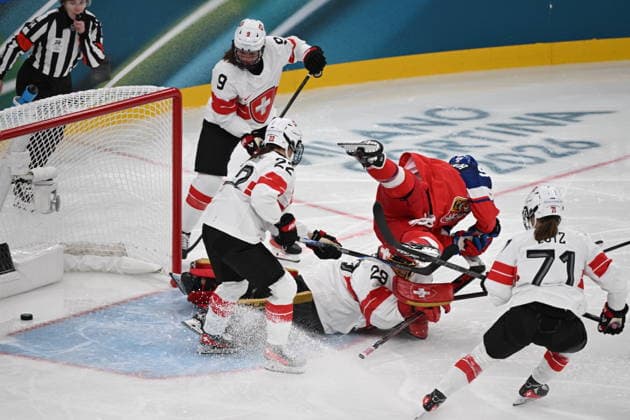 Kristyna Kaltounkova (CZE), in red, scores during women s Ice hockey, Eishockey match of Group A: Czechia vs Switzerland, at the Milano Cortina 2026 Winter Olympic Games, Olympische Spiele, Olympia, OS in Milan, Italy, on February 6, 2026. On the photo are seen (R-L) Lena Lutz (SUI), goalkeeper Saskia Maurer (SUI), Sinja Leemann (SUI) and Shannon Sigrist (SUI). (CTKxPhoto MichalxKamaryt) CTKPhotoP2026020606425  CTKPhotoP2026020606425