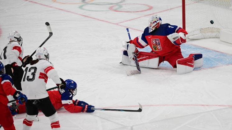 L-R Laura Zimmermann (SUI) scoring the first goal, and Ivana Wey (SUI) and goalkeeper Michaela Hesova (CZE) during women s Ice hockey, Eishockey match of Group A: Czechia vs Switzerland, at the Milano Cortina 2026 Winter Olympic Games, Olympische Spiele, Olympia, OS in Milan, Italy, on February 6, 2026. (CTKxPhoto MichalxKamaryt) CTKPhotoP2026020606884  CTKPhotoP2026020606884