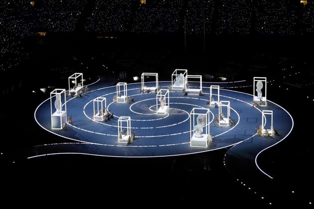 Dancers representing statues in a living museum preform .during the Opening Ceremony of the Milano Cortina 2026 Olympic Games, Olympische Spiele, Olympia, OS at San Siro Stadium in Milan, Italy, on Friday, February 6, 2026. More than 2,900 athletes from 92 national Olympic committees will compete, with the United States having the largest presence with more than 230 athletes.  OLY20260206307a AARONxJOSEFCZYK