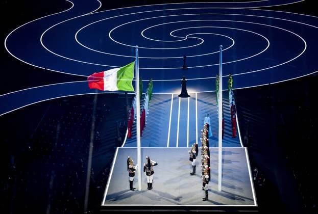 MILAN The Italian flag is raised during the opening ceremony of the Winter Olympics at the San Siro Stadium. SEM VAN DER WAL ANP xVIxANPxSportx xxANPxIVx 549840763 originalFilename: 549840763.jpg