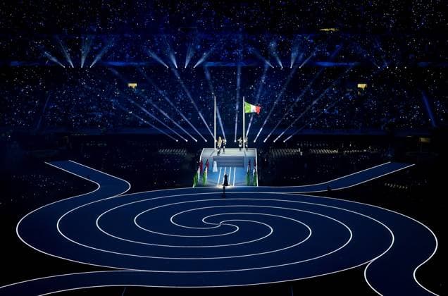 MILAN - The Italian flag is raised during the opening ceremony of the Winter Olympics at the San Siro Stadium. IRIS VAN DEN BROEK ANP xVIxANPxSportx xxANPxIVx 549840925 originalFilename: 549840925.jpg