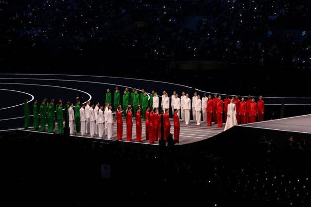 GIOCHI OLIMPICI - Olimpiadi Invernali Milano-Cortina 2026 - Opening Ceremony Models wearing italian flag color during the Opening Ceremony of the Olympic Winter games, Winterspiele,Spiele, Summer games Milano-Cortina 2026 on February 06, 2026 at the Milano San Siro Olympic Stadium in Milan, Italy Cortina D Ampezzo Italy  Copyright: xIPAxSport ABACAx