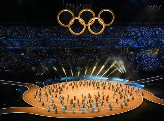 The Olympic Rings come together during the Opening Ceremony of the Milano Cortina 2026 Olympic Games, Olympische Spiele, Olympia, OS at San Siro Stadium in Milan, Italy, on Friday, February 6, 2026. More than 2,900 athletes from 92 national Olympic committees will compete, with the United States having the largest presence with more than 230 athletes.  OLY20260206121 RICHARDxELLIS