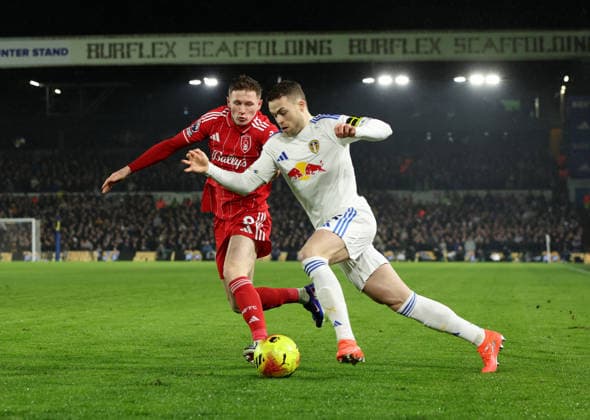 Leeds, England, 6th February 2026. Elliot Anderson of Nottingham Forest tussles with Gabriel Gudmundsson of Leeds United during the Leeds United vs Nottingham Forest Premier League match at Elland Road, Leeds. Picture credit should read: Nigel Roddis Sportimage EDITORIAL USE ONLY. No use with unauthorised audio, video, data, fixture lists, club league logos or live services. Online in-match use limited to 120 images, no video emulation. No use in betting, games or single club league player publications. SPI_015_NR_LEED_NOTT SPI-4510-0015