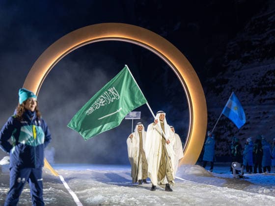 OLYMPICS - Winter Olympic Games, Olympische Spiele, Olympia, OS Milano Cortina 2026 VAL DI FIEMME,ITALY,06.FEB.26 - OLYMPICS - Winter Olympic Games Milano Cortina 2026, capsule opening ceremony. Image shows the team of Saudi Arabia with flagbearer Rakan Alireza (SAU).  GEPAxpictures xOliverxLerch