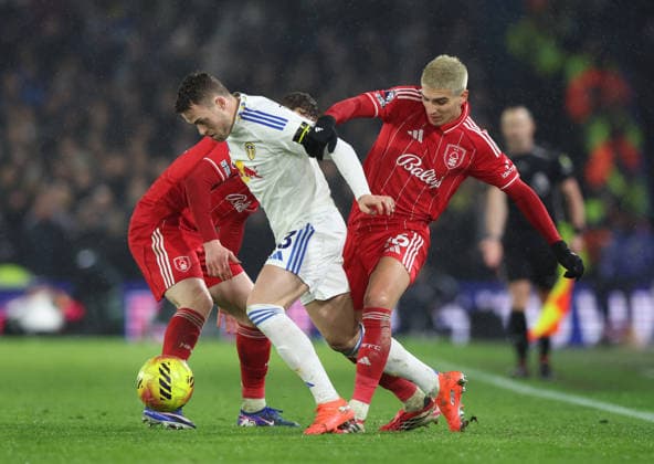 Leeds, England, 6th February 2026. Elliot Anderson and Nicolas Dominguez of Nottingham Forest tackle Gabriel Gudmundsson of Leeds United during the Leeds United vs Nottingham Forest Premier League match at Elland Road, Leeds. Picture credit should read: Nigel Roddis Sportimage EDITORIAL USE ONLY. No use with unauthorised audio, video, data, fixture lists, club league logos or live services. Online in-match use limited to 120 images, no video emulation. No use in betting, games or single club league player publications. SPI_019_NR_LEED_NOTT SPI-4510-0019