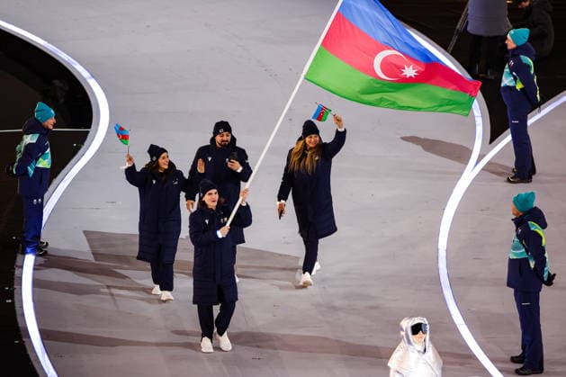 ITALY, MILAN - FEBRUARY 6, 2026: Members of the Olympic team of Azerbaijan emerge during a ceremony to open the 2026 Winter Olympic Games, Olympische Spiele, Olympia, OS at San Siro Stadium. Peter Kovalev TASS  88299071