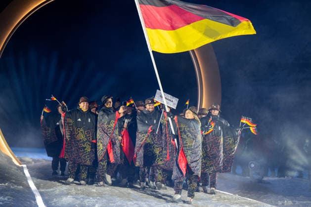 OLYMPICS - Winter Olympic Games, Olympische Spiele, Olympia, OS Milano Cortina 2026 VAL DI FIEMME,ITALY,06.FEB.26 - OLYMPICS - Winter Olympic Games Milano Cortina 2026, capsule opening ceremony. Image shows the team of Germany with flagbearer Katharina Schmid (GER).  GEPAxpictures xOliverxLerch