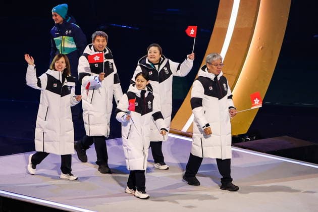 ITALY, MILAN - FEBRUARY 6, 2026: Members of the Olympic team of Hong Kong emerge during a ceremony to open the 2026 Winter Olympic Games, Olympische Spiele, Olympia, OS at San Siro Stadium. Peter Kovalev TASS  88301291