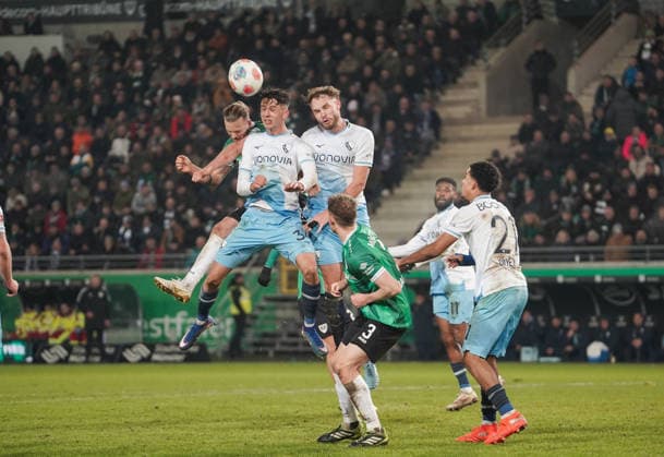Germany 2 Bundesliga 2025 2026, SC Preußen Münster vs VFL Bochum, Friday 06 02 2026 LVM Preußenstadion Nordrhein Westfalen, Germany Header duel Philipp Strompf VfL Bochum, 3 Jorrit Hendrix SC Preußen Münster, 20 Cajetan Lenz VfL Bochum, 34 Copyright: xMerlexKölkingx