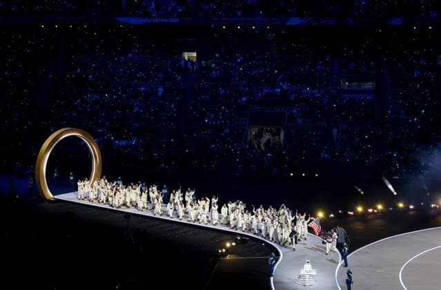 MILAN The United States of America team during the opening ceremony of the Winter Olympics at the San Siro Stadium. ROBIN VAN LONKHUIJSEN ANP xVIxANPxSportx xxANPxIVx 549851391 originalFilename: 549851391.jpg