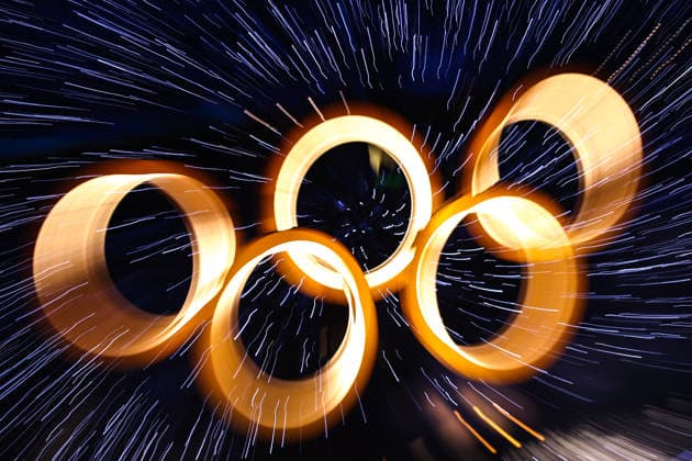 ITALY, MILAN - FEBRUARY 6, 2026: Olympic rings rise during a ceremony to open the 2026 Winter Olympic Games, Olympische Spiele, Olympia, OS at San Siro Stadium. Mikhail Tereshchenko TASS  88304528