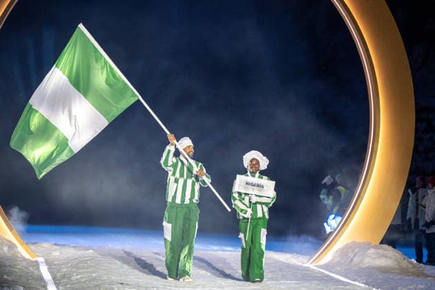 OLYMPICS - Winter Olympic Games, Olympische Spiele, Olympia, OS Milano Cortina 2026 VAL DI FIEMME,ITALY,06.FEB.26 - OLYMPICS - Winter Olympic Games Milano Cortina 2026, capsule opening ceremony. Image shows the team of Nigeria with flagbearer Samuel Uduigowme (NIG).  GEPAxpictures xOliverxLerch