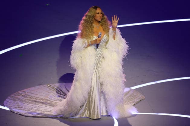 February 6, 2026, Milan, Lombardy, Italy: Pop music icon MARIAH CAREY, dressed by Italian designer Fausto Puglisi, performs Domenico ModugnoÃ¢â‚¬â ¢s Volare before singing her own hit Nothing is Impossible during the Opening Ceremony of the XXV Winter Olympic Games, Olympische Spiele, Olympia, OS commonly know as the Milano Cortina 2026 Winter Olympic Games. Milan Italy - ZUMAc179 20260206_oly_c179_140 Copyright: xMickaelxChavetx