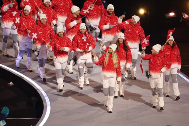 February 6, 2026, Milan, Lombardy, Italy: Team Switzerland of whom figure skater KIMMY REPOND march into the San Siro Stadium during the Parade of Nations of the Opening Ceremony of the XXV Winter Olympic Games, Olympische Spiele, Olympia, OS commonly know as the Milano Cortina 2026 Winter Olympic Games. Milan Italy - ZUMAc179 20260206_oly_c179_182 Copyright: xMickaelxChavetx