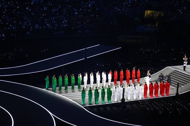 February 6, 2026, Milan, Lombardy, Italy: Elite fashion model VITTORIA CERETTI carries the flag of Italy during the Opening Ceremony of the XXV Winter Olympic Games, Olympische Spiele, Olympia, OS commonly know as the Milano Cortina 2026 Winter Olympic Games. Milan Italy - ZUMAc179 20260206_oly_c179_192 Copyright: xMickaelxChavetx