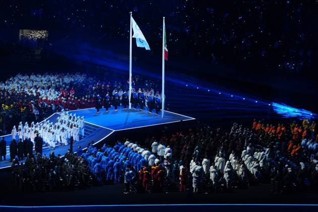 February 6, 2026, Milan, ITALY: The Olympic flag is raised during the opening ceremony at the Milan Cortina Winter Olympics, in Milan, on Friday, February 6, 2026. Canada News - February 6, 2026  - ZUMAc35_ 20260206_zaf_c35_248 Copyright: xDarrylxDyckx
