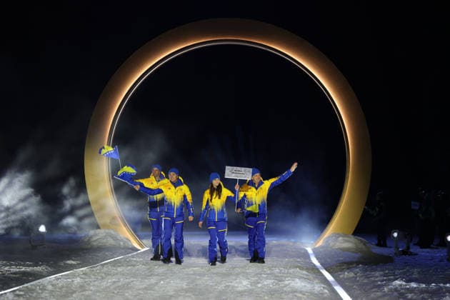 (260207) -- PREDAZZO, Feb. 7, 2026 -- The delegation of Bosnia and Herzegovina parades into the Predazzo Ski jumping, Skispringen, Ski, nordisch Stadium during the opening ceremony of the Milan-Cortina 2026 Olympic Winter games, Winterspiele,Spiele, Summer games in Predazzo, Italy, Feb. 6, 2026. ) (MICO2026)ITALY-MILAN-CORTINA 2026-OLYMPIC WINTER GAMES-OPENING CEREMONY HuangxWei 