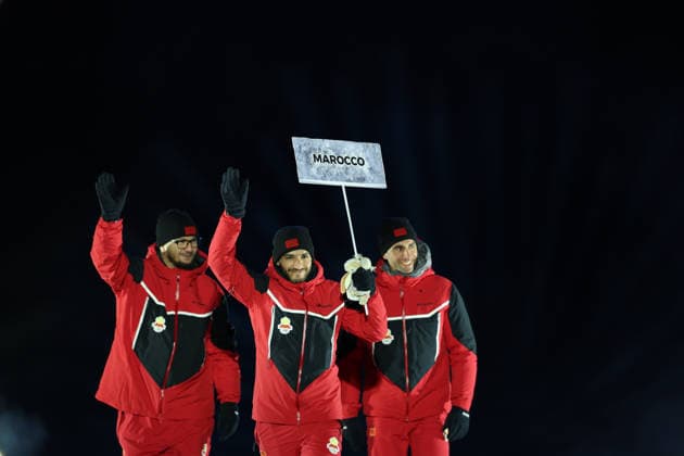 (260207) -- PREDAZZO, Feb. 7, 2026 -- The delegation of Morocco parades into the Predazzo Ski jumping, Skispringen, Ski, nordisch Stadium during the opening ceremony of the Milan-Cortina 2026 Olympic Winter games, Winterspiele,Spiele, Summer games in Predazzo, Italy, Feb. 6, 2026. ) (MICO2026)ITALY-MILAN-CORTINA 2026-OLYMPIC WINTER GAMES-OPENING CEREMONY HuangxWei 