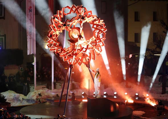 (260207) -- CORTINA D AMPEZZO, Feb. 7, 2026 -- Torchbearer Sofia Goggia of Italy ignites the cauldron of the Milan-Cortina 2026 Olympic Winter games, Winterspiele,Spiele, Summer games in Piazza Angelo Dibona in Cortina, Italy, Feb. 6, 2026. ) (MICO2026)ITALY-MILAN-CORTINA 2026-OLYMPIC WINTER GAMES-OPENING CEREMONY DingxXu 