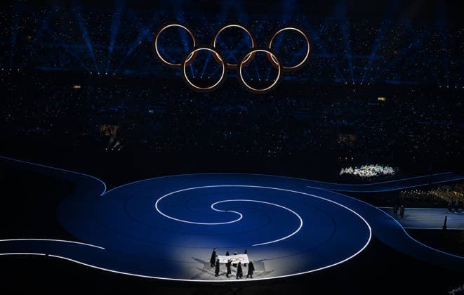 (260207) -- MILAN, Feb. 7, 2026 -- Flag bearers carry the Olympic flag into the San Siro Olympic Stadium during the opening ceremony of the Milan-Cortina 2026 Olympic Winter games, Winterspiele,Spiele, Summer games at the San Siro Olympic Stadium in Milan, Italy, Feb. 6, 2026. ) (MICO2026)ITALY-MILAN-CORTINA 2026-OLYMPIC WINTER GAMES-OPENING CEREMONY ChengxMin 