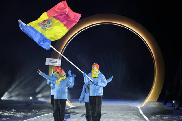 (260207) -- PREDAZZO, Feb. 7, 2026 -- The delegation of Moldova parades into the Predazzo Ski jumping, Skispringen, Ski, nordisch Stadium during the opening ceremony of the Milan-Cortina 2026 Olympic Winter games, Winterspiele,Spiele, Summer games in Predazzo, Italy, Feb. 6, 2026. ) (MICO2026)ITALY-MILAN-CORTINA 2026-OLYMPIC WINTER GAMES-OPENING CEREMONY HuangxWei 