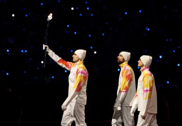 (260207) -- MILAN, Feb. 7, 2026 -- Torchbearers walk with the Olympic flame during the opening ceremony of the Milan-Cortina 2026 Olympic Winter games, Winterspiele,Spiele, Summer games at the San Siro Olympic Stadium in Milan, Italy, Feb. 6, 2026. ) (MICO2026)ITALY-MILAN-CORTINA 2026-OLYMPIC WINTER GAMES-OPENING CEREMONY LixJing 