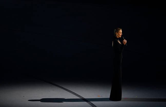(260207) -- MILAN, Feb. 7, 2026 -- Actress Charlize Theron performs during the opening ceremony of the Milan-Cortina 2026 Olympic Winter games, Winterspiele,Spiele, Summer games at the San Siro Olympic Stadium in Milan, Italy, Feb. 6, 2026. ) (MICO2026)ITALY-MILAN-CORTINA 2026-OLYMPIC WINTER GAMES-OPENING CEREMONY ZhangxHaofu 