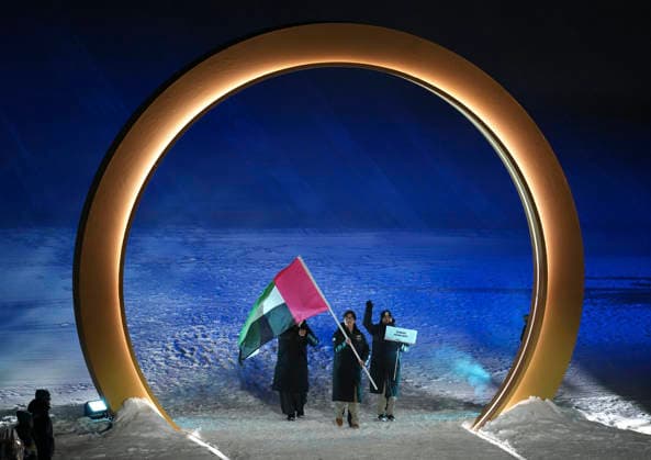 (260207) -- LIVIGNO, Feb. 7, 2026 -- Members of the delegation of the United Arab Emirates attend the parade of athletes during the opening ceremony of the Milan-Cortina 2026 Olympic Winter games, Winterspiele,Spiele, Summer games in Livigno, Italy, Feb. 6, 2026. ) (MICO2026)ITALY-MILAN-CORTINA 2026-OLYMPIC WINTER GAMES-OPENING CEREMONY XiaxYifang 